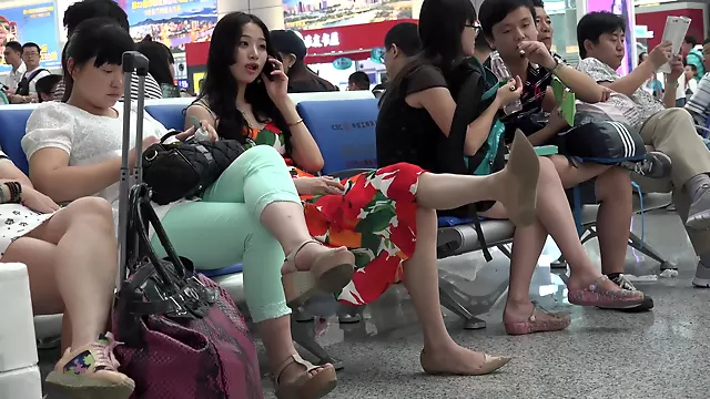 Asian Beauty In Summer Dress Caught On The Airport Dangling Her Shoe
