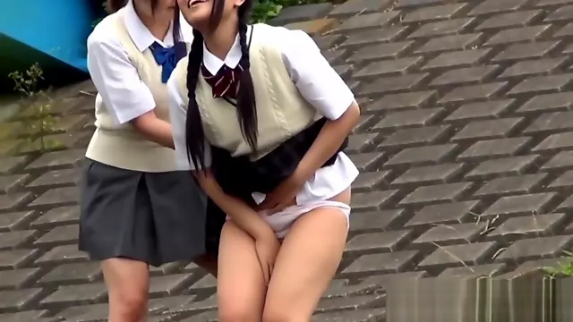 Asian teenagers urinate