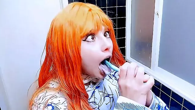 Redhead brushes her teeth