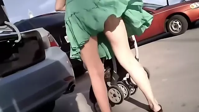 Young milf accidentally shows upskirt