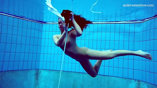 Alla Birtakik Undresses Nude In The Swimming Pool