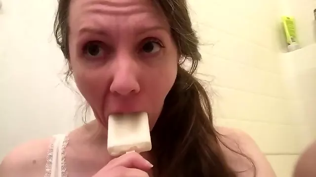 Hairy MILF gets messy with a creamy white coconut popsicle