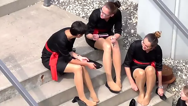 Candid of 4 pantyhosed hostesses