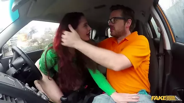 Crazy redhead fucks car gearstick
