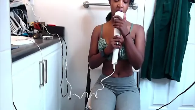Amateur Black Girl Squirts And Drenches Her Gym Clothes With a Hitachi Wand